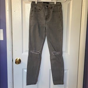 Olive green, ripped knee jeans